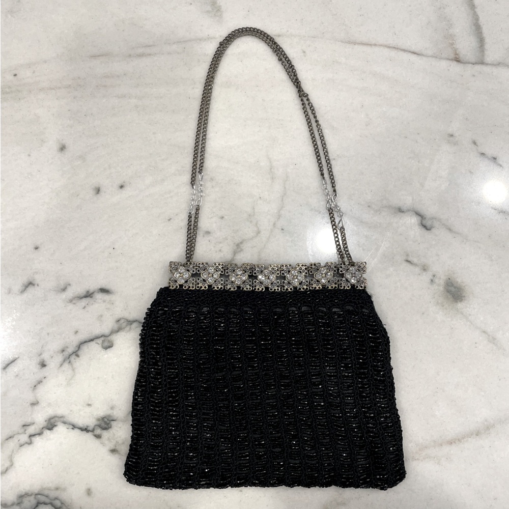 Vintage-style Black beaded evening purse with silver and rhinestone detail.
